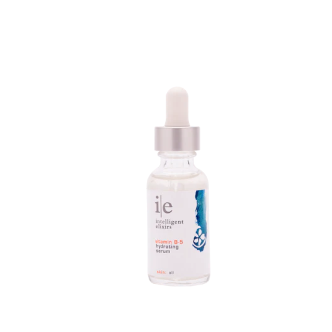Vitamin B-5 Hydrating Serum in a clear glass bottle with a dropper and silver cap.