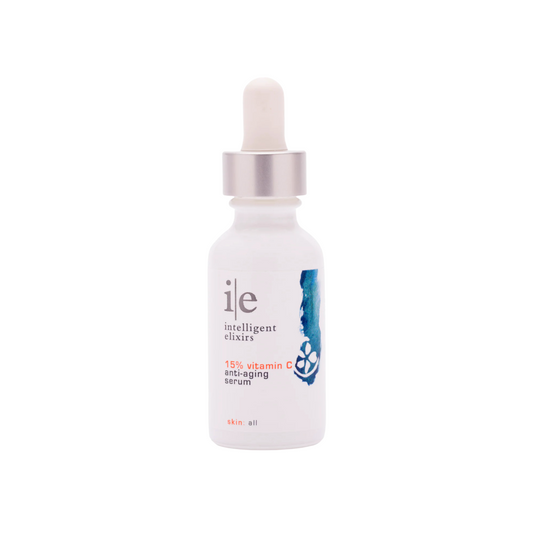 15% vitamin C anti-aging serum in a white glass bottle with a dropper.