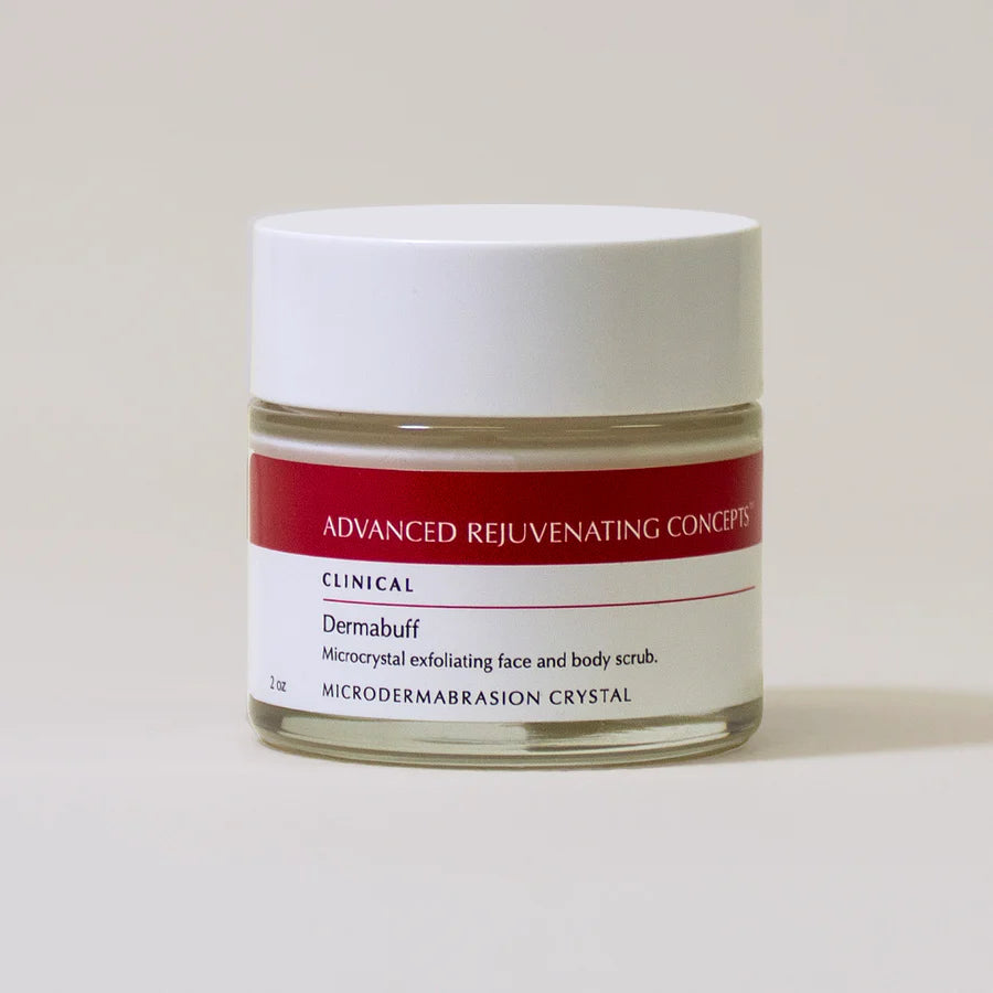Revitalizing Scrub in a clear jar with a red label, designed for microcrystal exfoliation of face and body.