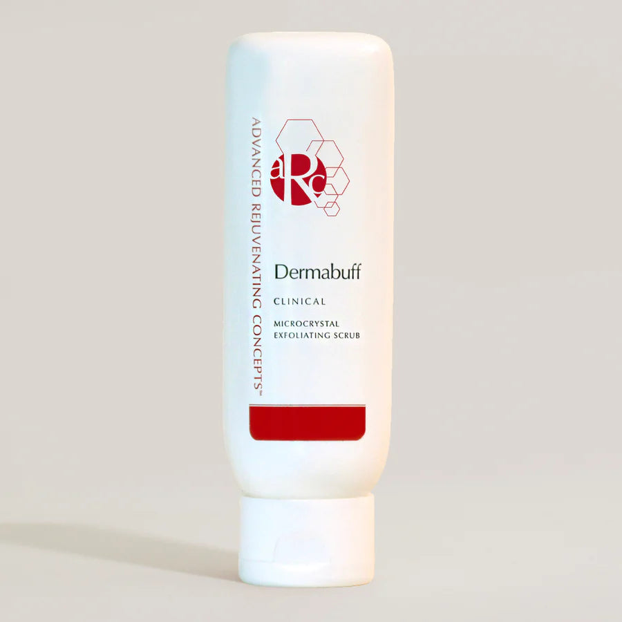 Dermabuff microcrystal exfoliating scrub in a white tube with red accents.