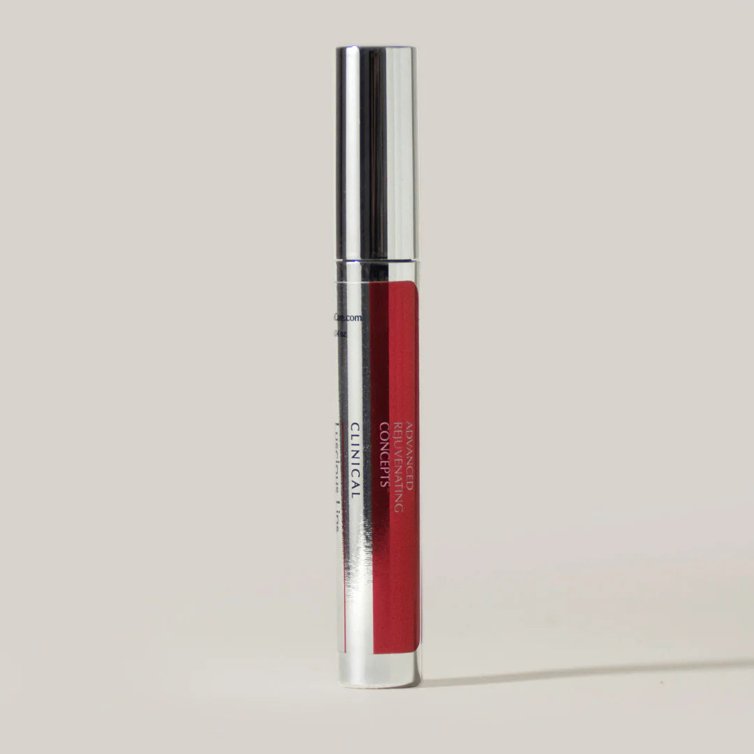 Luscious Lips Plumping Treatment in a sleek silver and red tube for fuller, more voluminous lips.