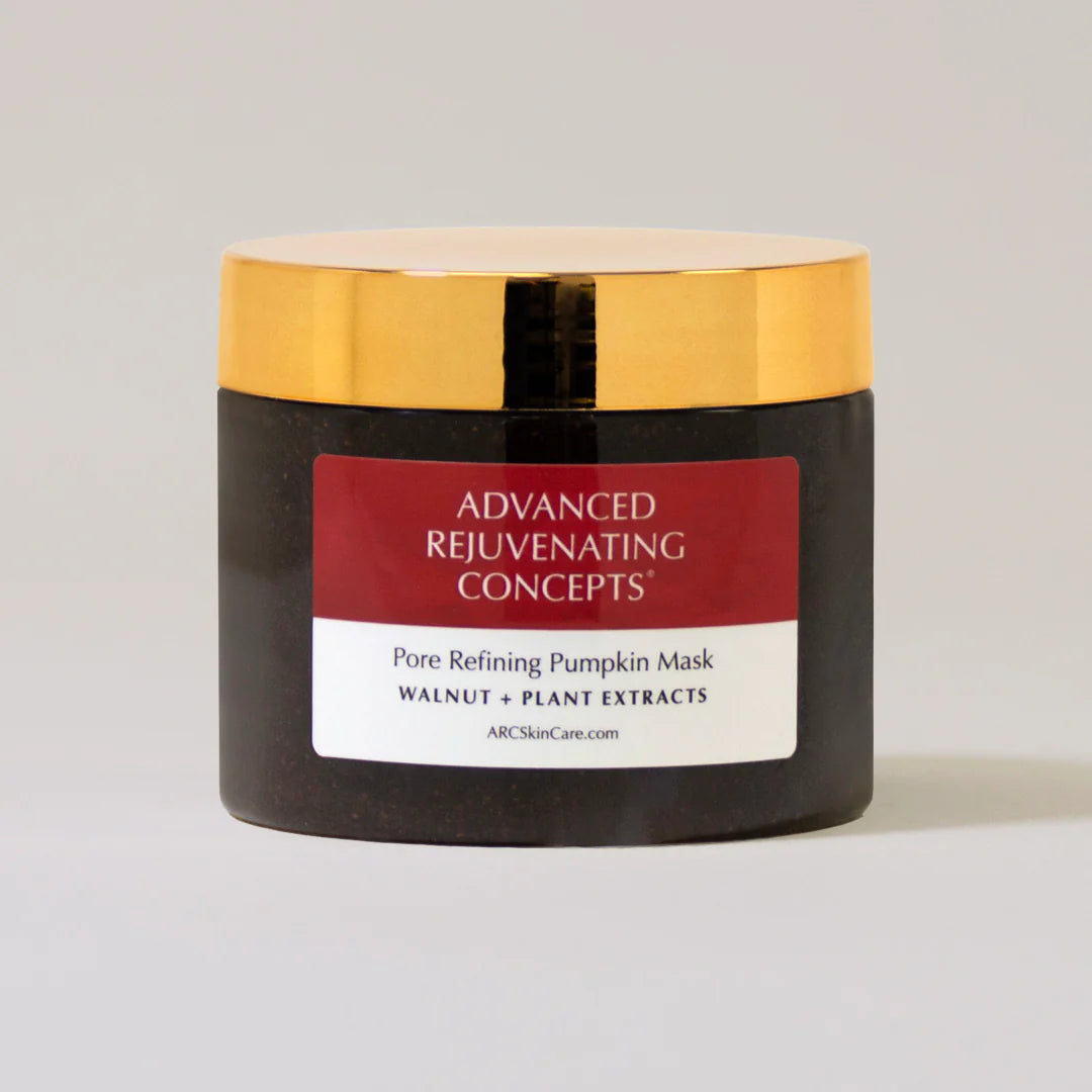 Pore Refining Pumpkin Mask in a black jar with a gold lid, featuring walnut and plant extracts.