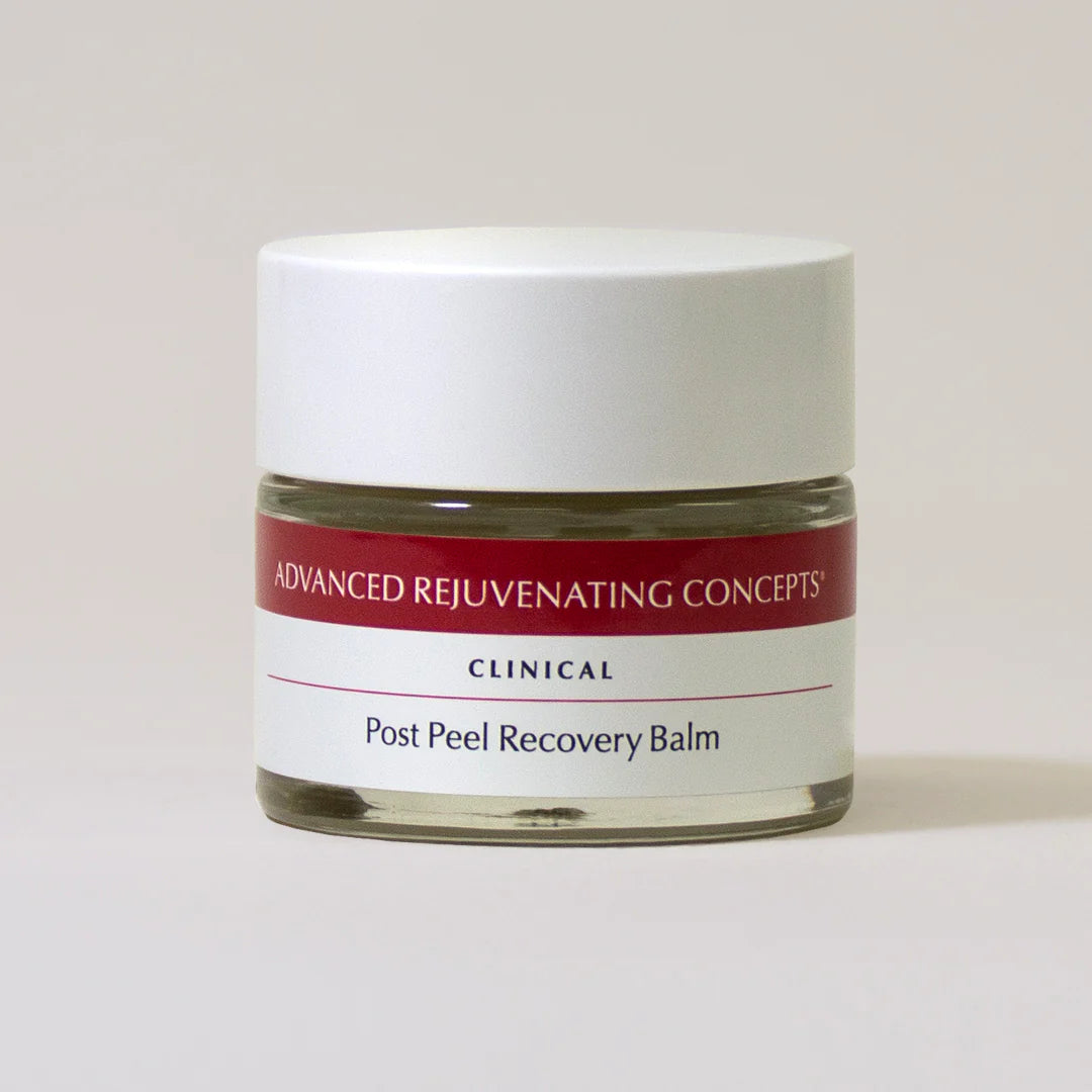 Post Peel Recovery Balm in a clear jar with a white lid and red label for skin rejuvenation.