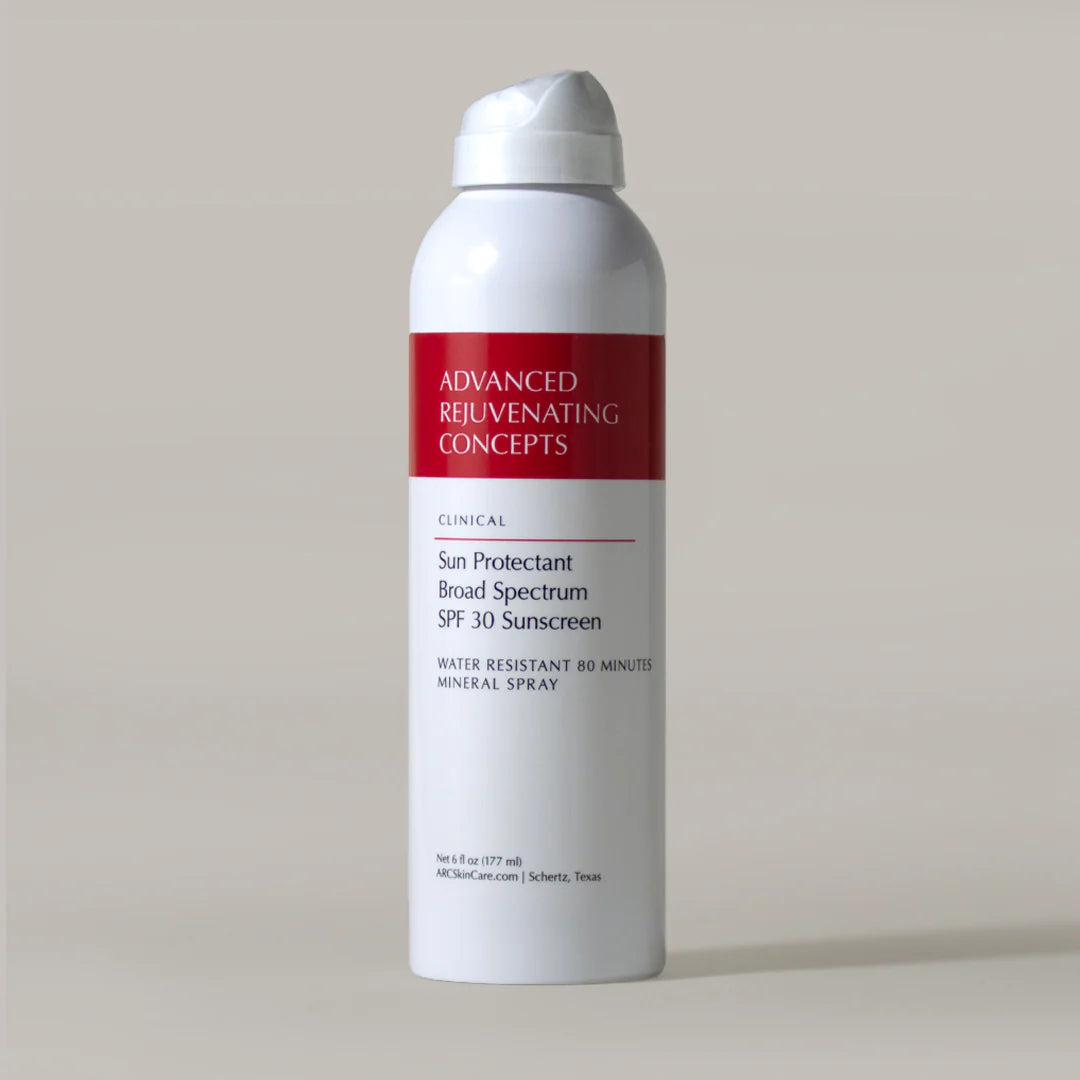 Sun Protectant Mineral Spray with SPF 30, water-resistant for 80 minutes, in a sleek white bottle.