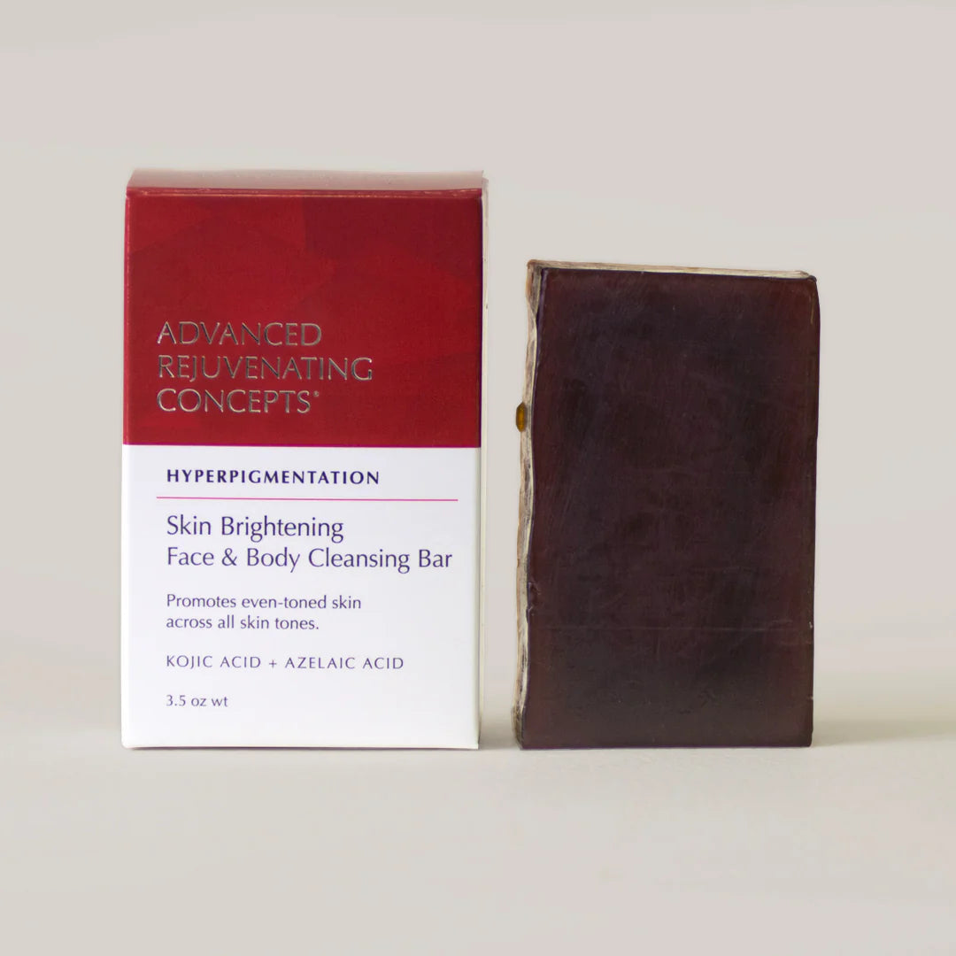 Brightening Face & Body Cleansing Bar in a brown color, promotes even-toned skin with kojic acid and azelaic acid.