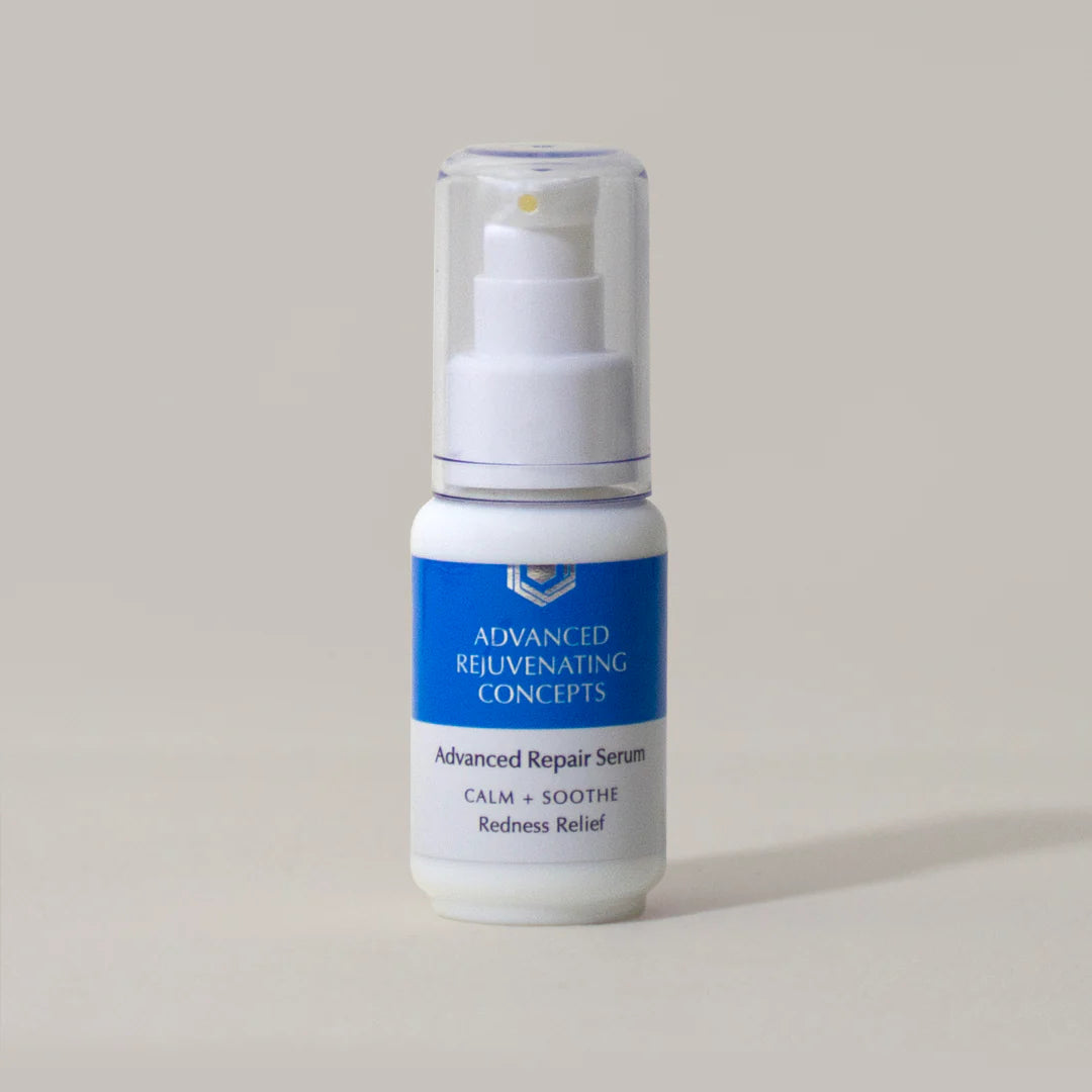 Advanced Repair Serum in a white bottle with a blue label, designed for calming and soothing redness relief.