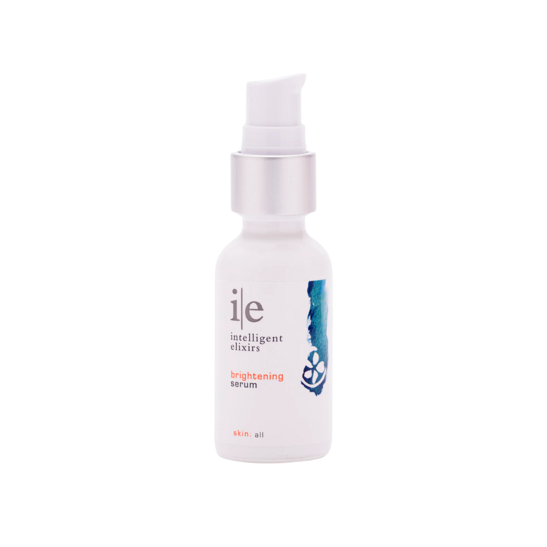 Bottle of ie intelligent elixirs brightening serum on a white background